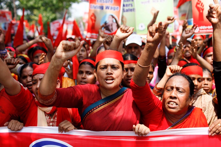 Bangladeshi garment workers attend a rally, demanding their rights including safety, a minimum monthly salary, and equal salary for equal work.