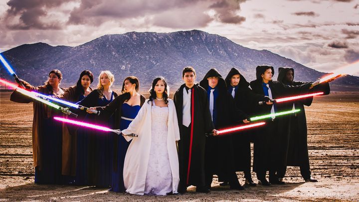 The whole bridal party took part in a choreographed lightsaber battle during the reception. 
