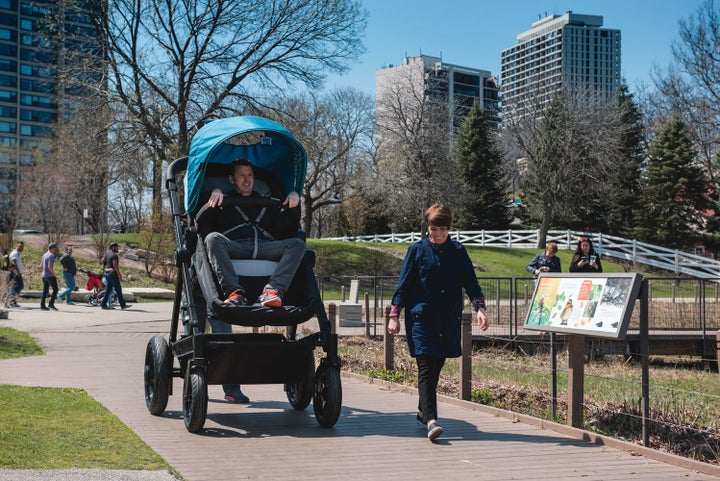 Parents in Chicago test out an adult-sized stroller to see what their kids are getting into.