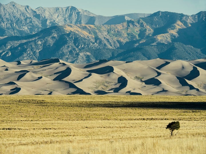 Things to do in U.S. National Parks: hike, camp…sandboard. You weren’t expecting that last one were you? It’s true. You can sandboard in Colorado’s Great Sand Dunes National Park.
