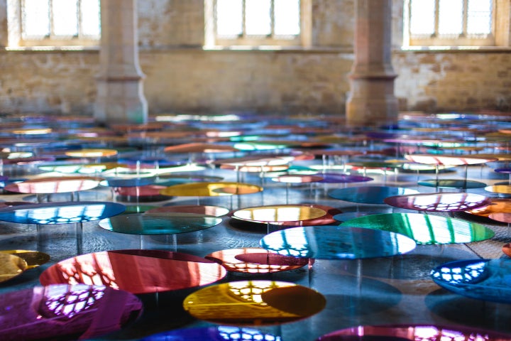 The mirrors reflect the walls, ceiling and nave of the former St John's Church.