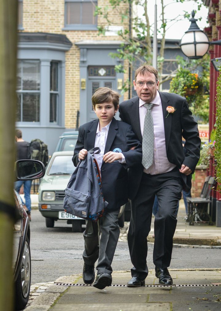 Ian rushes Bobby out of the pub 