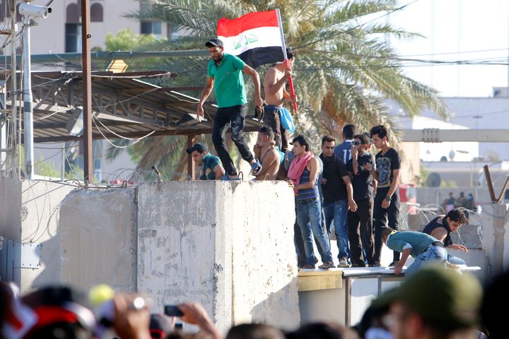 Protesters stormed into Baghdad's heavily fortified Green Zone on Friday for the second time in weeks.
