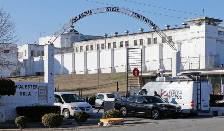 In this Jan. 15, 2015, file photo, a news van arrives at the front gate of the Oklahoma State Penitentiary for the scheduled execution of Charles Warner.