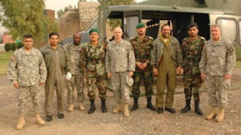 Sangi, left, with senior military officers from U.S, Afghanistan Army and Pakistan Army, in Peshawar, Pakistan, in 2006 or 20