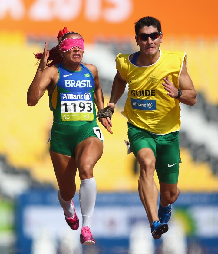 Guilhermina competes in the women's 100-meter T11 heats during the Morning Session on day six of the IPC Athletics World Championships at Suhaim Bin Hamad Stadium in Doha, Qatar, Oct. 27, 2015.