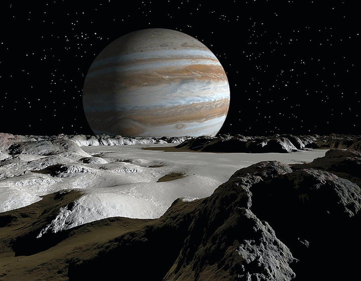 Jupiter's large moon, Europa, is covered by a thick crust of ice above a vast ocean of liquid water.