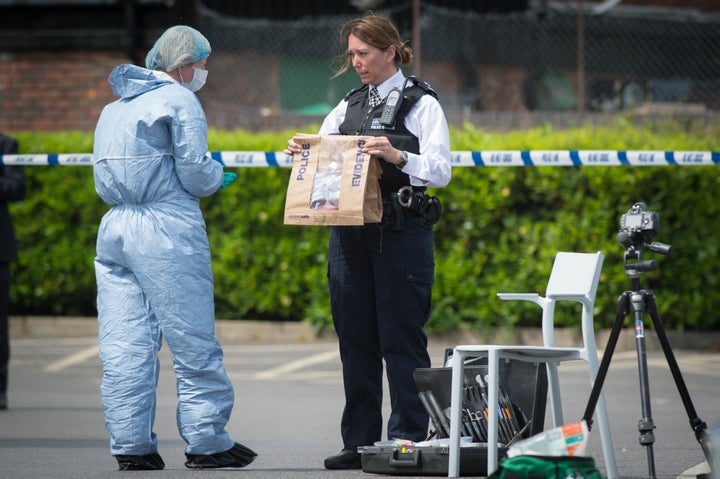<strong>Police and forensic officers at the scene in Hampton</strong>