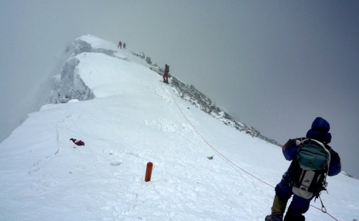 More than 300 people have climbed Mount Everest since May 11. Here, mountaineers descend from the summit in May 2009.