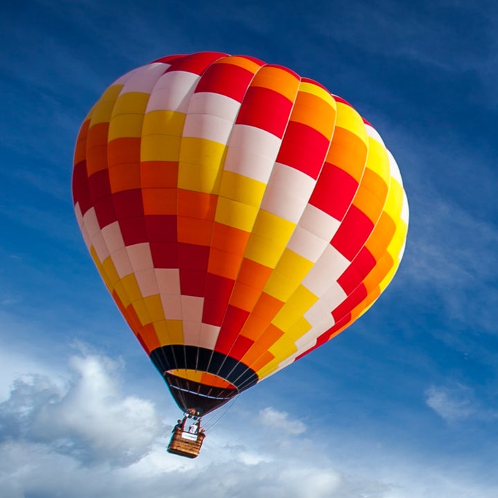 <strong>A woman was taken to hospital after her hot air balloon crashed in Northamptonshire. (File image).</strong>