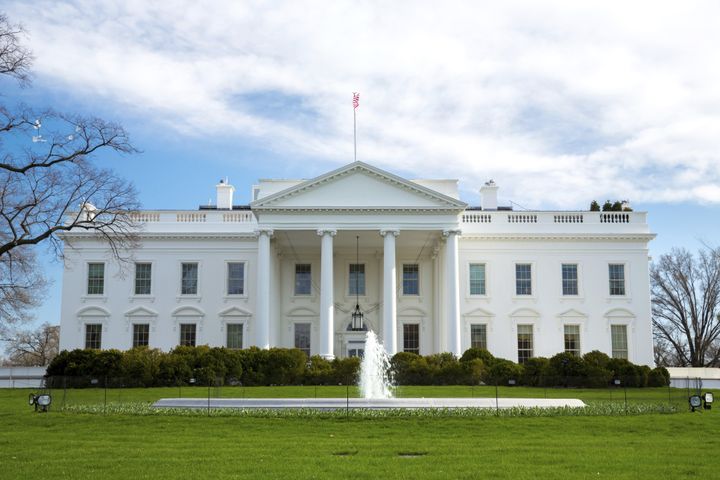 The White House reportedly underwent a brief lockdown Sunday after a pair of balloons landed on the property.