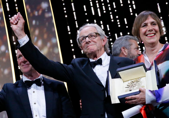 <strong>Director Ken Loach reacts next to producer Rebecca O'Brien (R) during the closing ceremony of the Cannes Film Festival.</strong>