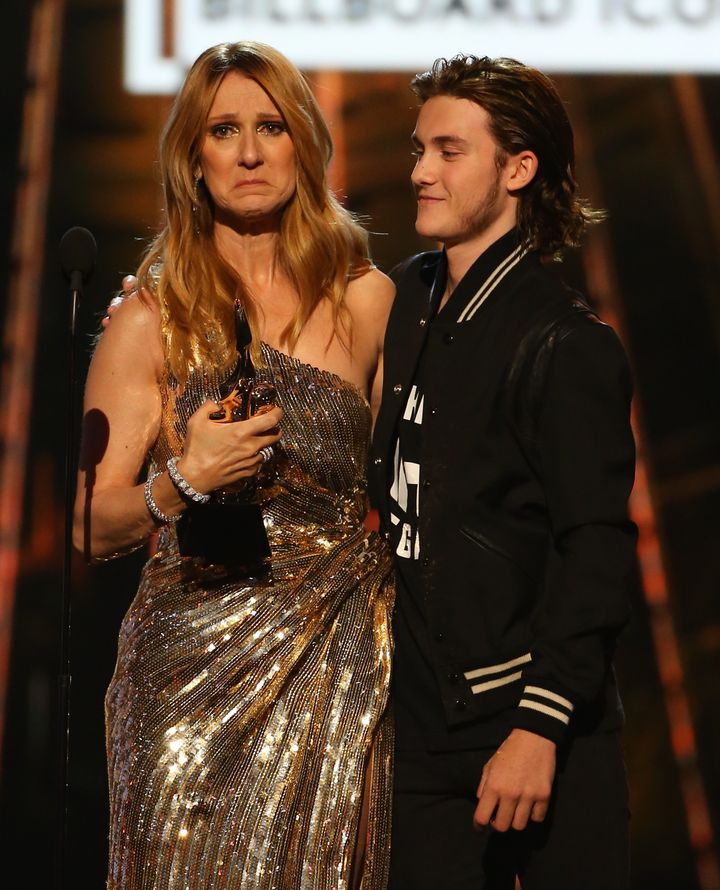 Celine was comforted on stage by her son as she broke down in accepting her Icon Award