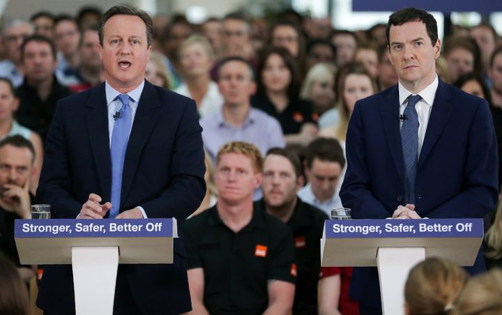 George Osborne listens as David Cameron delivers a speech on the economic impact of the UK leaving the European Union