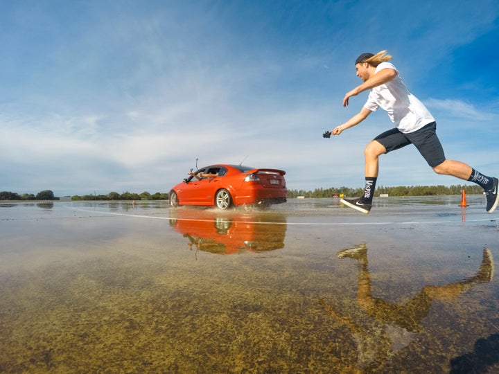 Snowboarder Sage Kotsenburg chases a drifting Supercar with cameras attached on every surface.