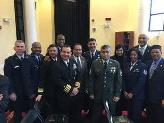 Hanif Sangi, in the green uniform in the front row, stands with fellow Muslims in the United States military during President