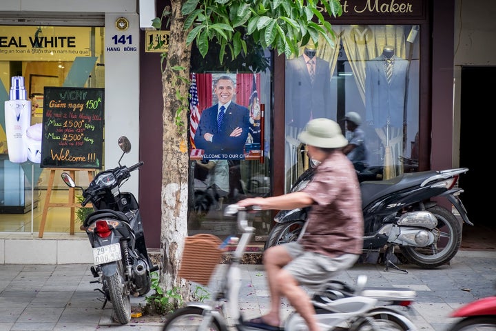 A poster of U.S. President Barack Obama in front of a tailor shop on May 23, 2016 in Hanoi, Vietnam.