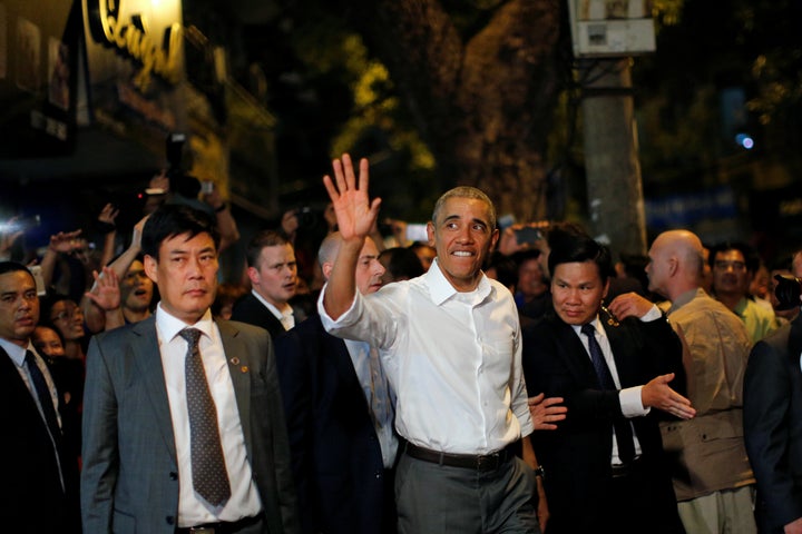 U.S. President Barack Obama waves as he leaves after having a dinner with Anthony Bourdain at a restaurant in Hanoi, Vietnam May 23, 2016.