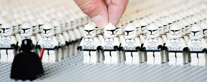 A Lego employee helps assemble an army of Star Wars Clone Troopers in this file photo. A recent study found that Lego kits have become much more violent in the last 30 years.