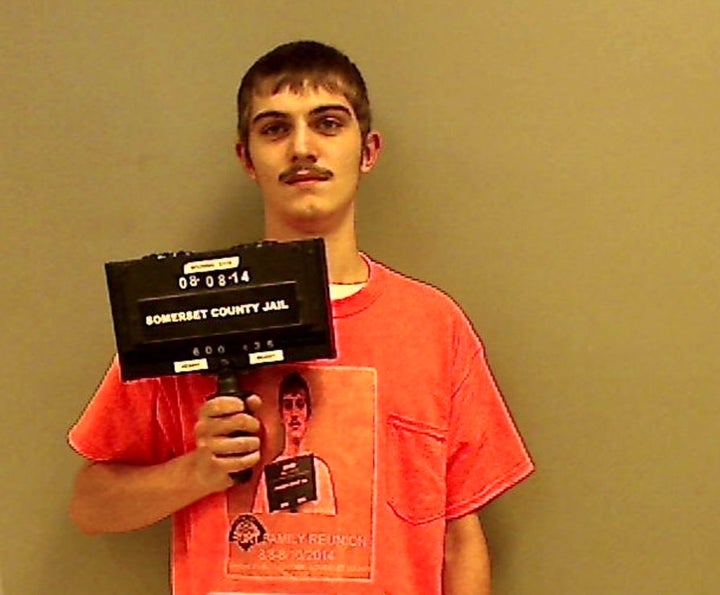 Robert Burt, 19, wore his mugshot in his mugshot following a drunk driving arrest in 2014.