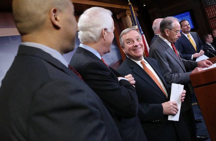 Senate Minority Whip Dick Durbin (third from left) is irritated Senate Republicans have not brought up criminal justice reform legislation for a vote.