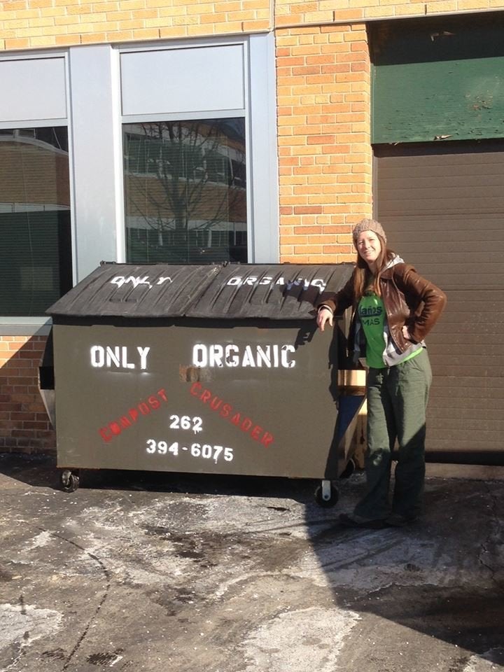 Tashjian by one of Compost Crusader's dumpsters.