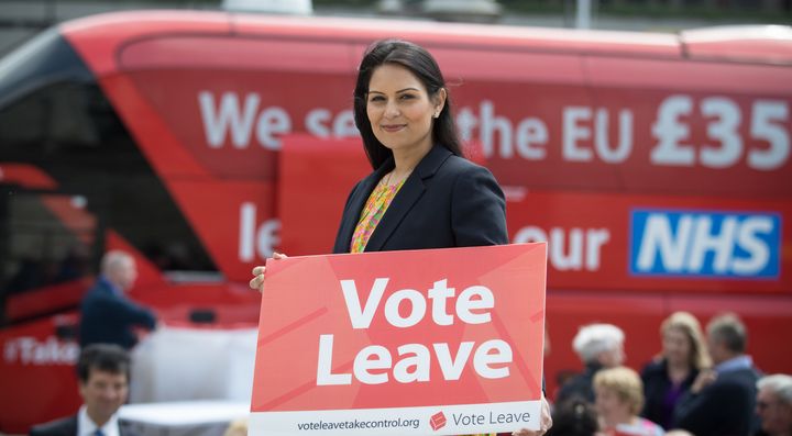 Priti Patel holds a Vote Leave poster