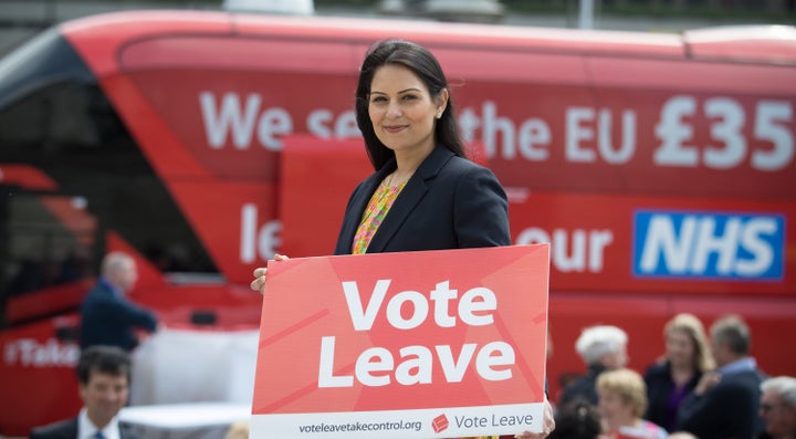 Priti Patel holds a Vote Leave poster