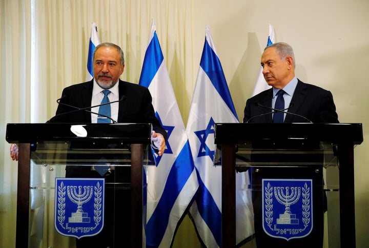 Benjamin Netanyahu, right, and Avigdor Lieberman issued assurances that the new right-wing government would behave responsibly and continue to seek peace with Israel's neighbors.