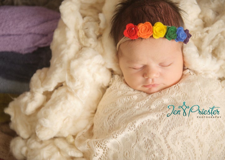 Cathy Matthews enlisted photographer Jen Priester to take these gorgeous rainbow baby pictures.