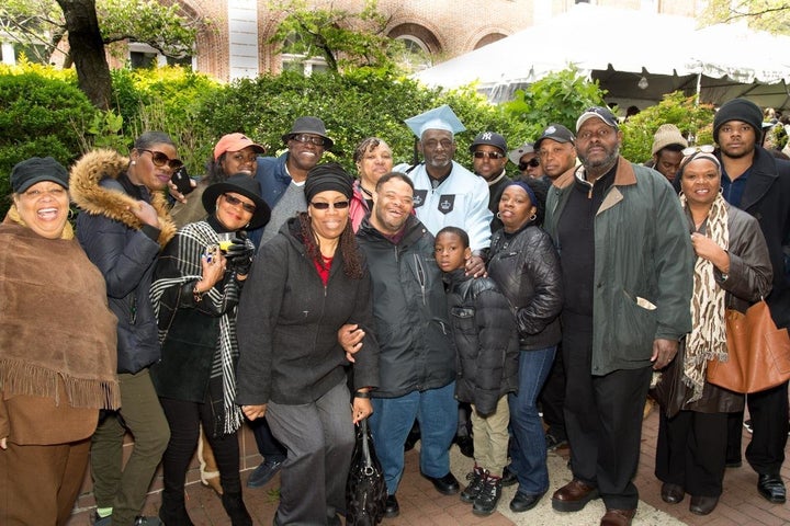 Norman, surrounded by proud loved ones.