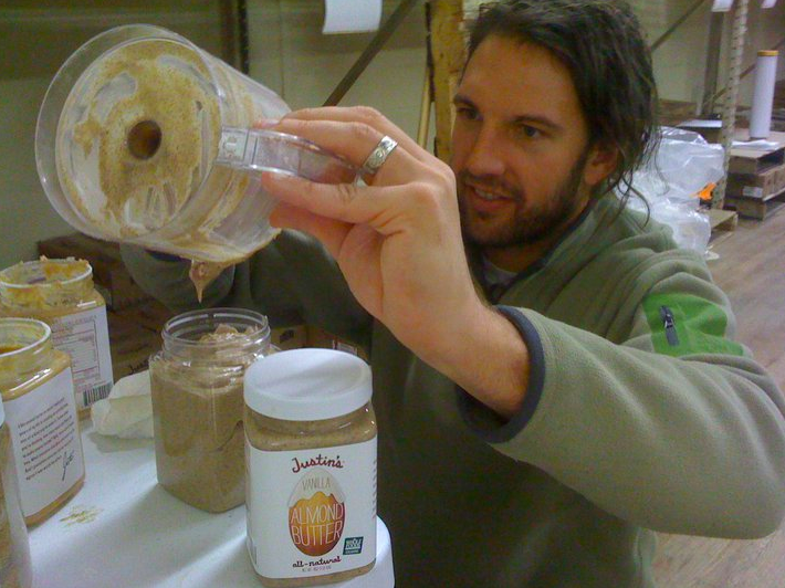 In this 2010 photo, Justin Gold scoops out a fresh batch of vanilla-flavored almond butter.