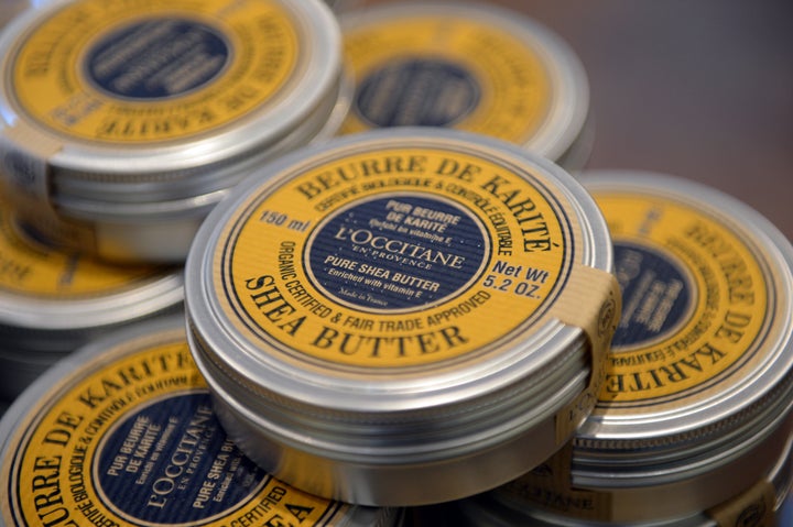 Organic and fair trade shea butter tins at French cosmetics company L'Occitane production site in Manosque, southeastern France. '