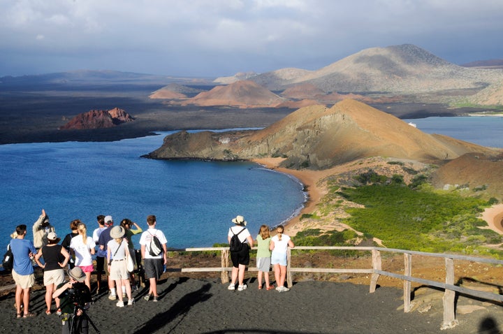 Areas like Ecuador's Galapagos Islands, a World Heritage site, are already under threat from rapid development.