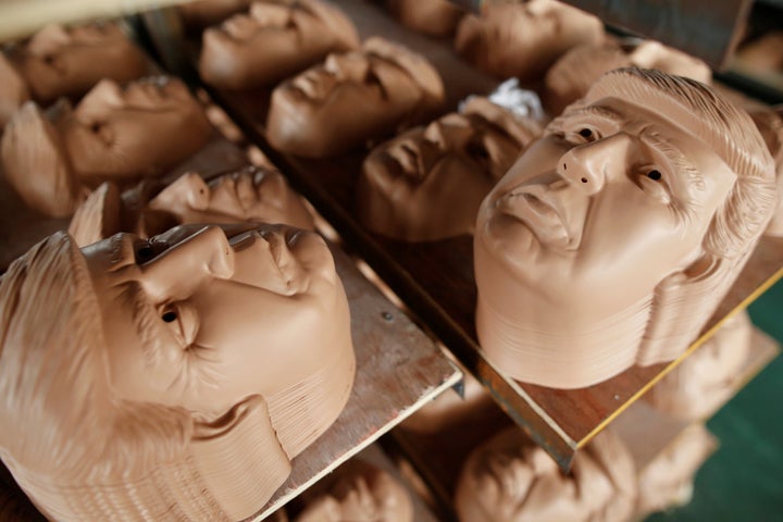 The Jinhua Partytime Latex Art and Crafts Factory is churning out masks of presidential candidates Hillary Clinton and Donald Trump.