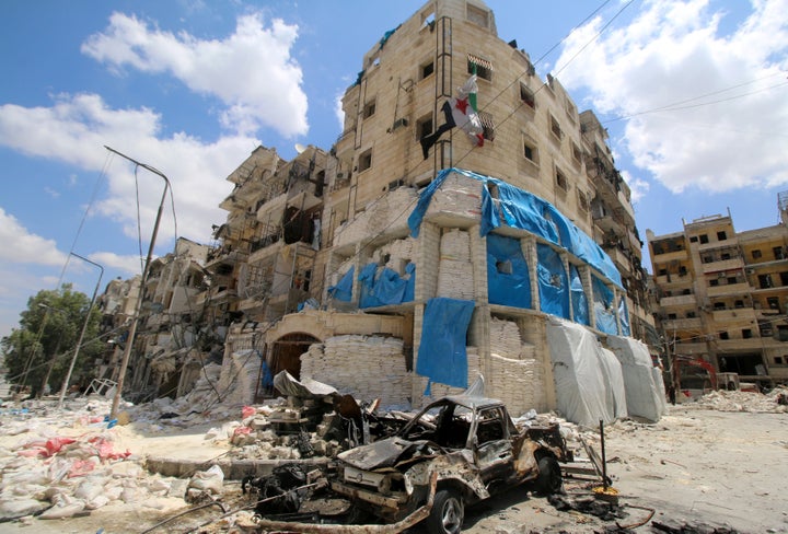 Burned vehicles are pictured in front of the al-Quds hospital in Aleppo, Syria, after it was hit by airstrikes. Syria had the most attacks on hospitals, ambulances, patients and medical workers.