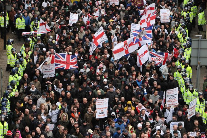 <strong>English Defence League members march through Luton.</strong>