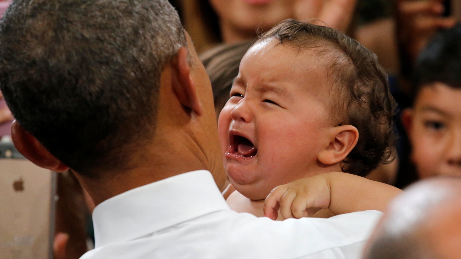Obama Works His Magic On Crying Baby In Japan Huffpost