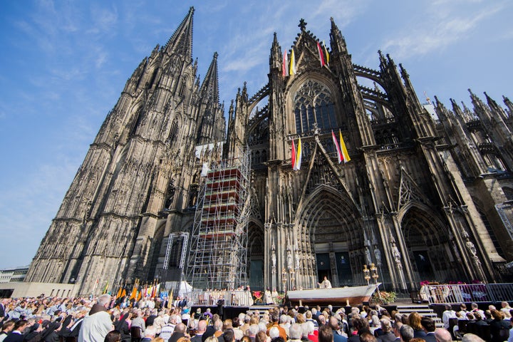 Crowds gather outside Germany's Cologne Cathedral for the Corpus Christi Mass. 