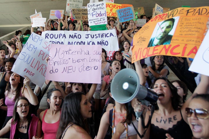 In this file photo, women take part in the "Marcha das Vagabundas" (Slutwalk) protest in Brasilia June 18, 2011. A video depicting the gang rape of a young woman has prompted a vigorous discussion here about sexism, violence against women and impunity in Brazil. 