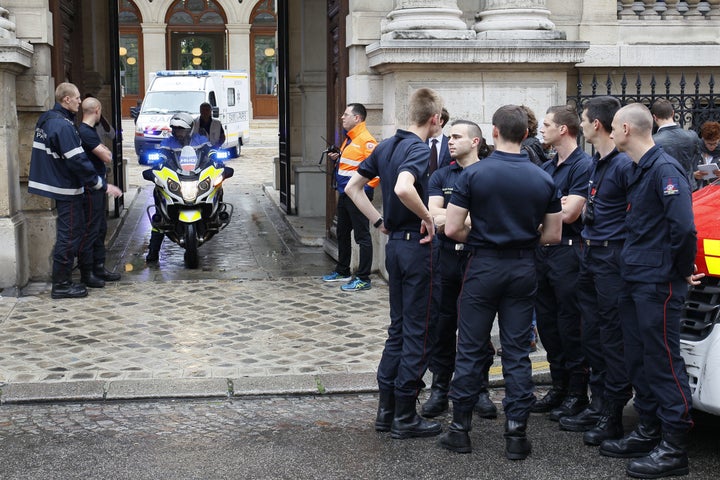 An ambulance leaves a building requisitioned to treat injured people, near the site of the accident at Parc Monceau in Paris, on May 28, 2016, after 11 people including 10 children were struck by lightning in the park