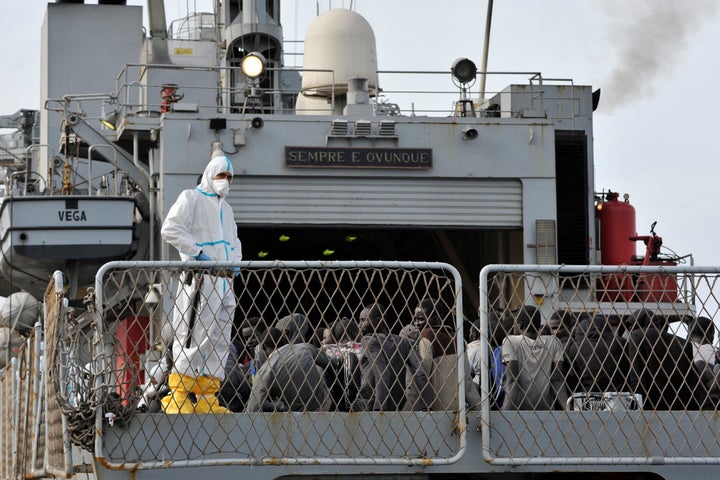 The Italian Navy ship 'Vega' arrives with more than 600 migrants and refugees on May 29, 2016 in the port of Reggio Calabria, southern Italy. (GIOVANNI ISOLINO/AFP/Getty Images)