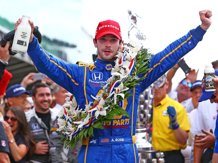 IndyCar Series driver Alexander Rossi celebrates after winning the 100th running of the Indianapolis 500.