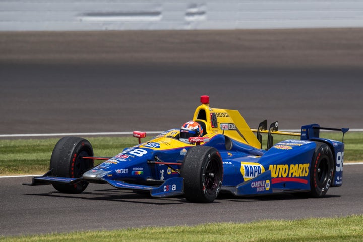 Rossi found himself on top of the motorsports world after squeezing just enough fuel out of his Andretti Autosport Honda