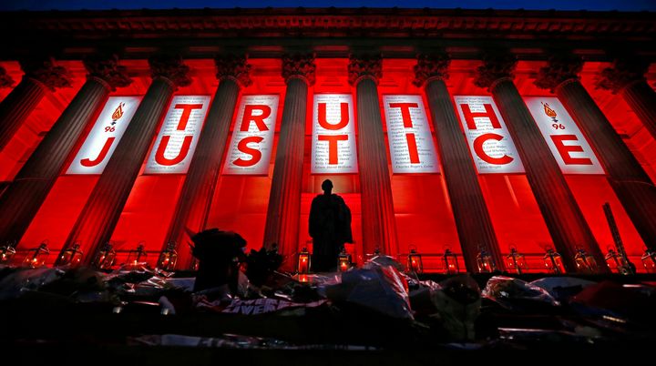 St George's Hall in Liverpool is illuminated following a special commemorative service to mark the outcome of the Hillsborough inquest