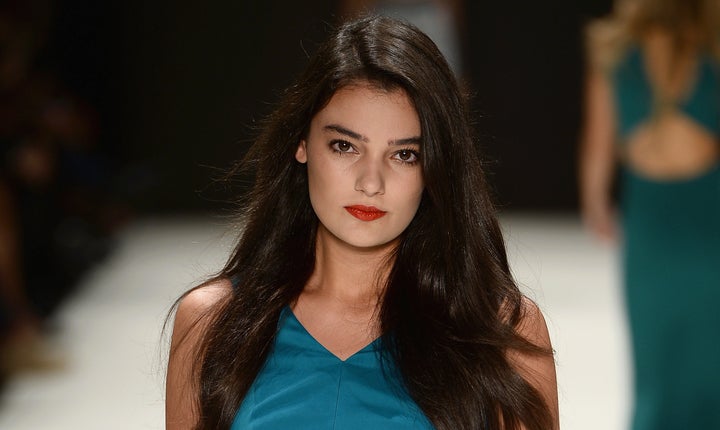 Model Merve Buyuksarac walks the runway at the ADL & Cengiz Abazoglu show during Mercedes-Benz Fashion Week Istanbul on October 8, 2013 in Istanbul, Turkey.