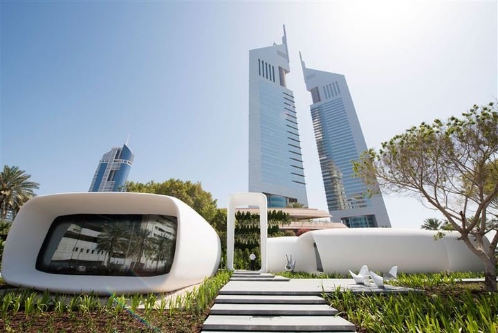 The small, rounded buildings in the foreground are entirely 3D-printed.