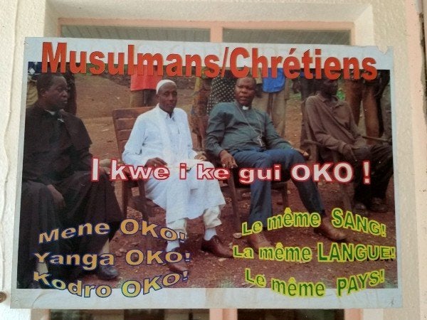 A sign outside a radio station in the capital city of Bangui encourages peace between Christians and Muslims.