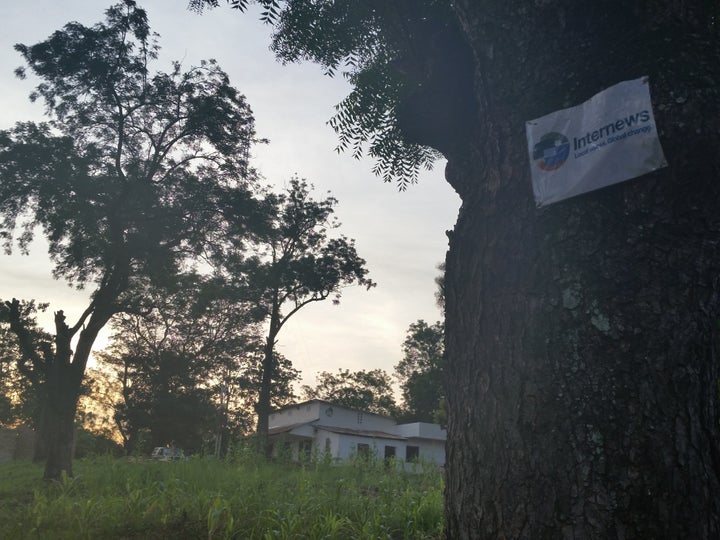 A tree marks the entrance to Radio Voice of Ouaka. The station broadcasts for two hours a day, mainly message of peace and practical information about services and aid distribution.