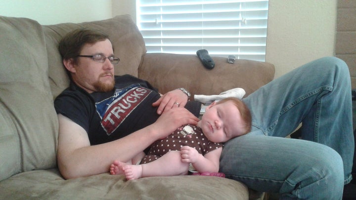 Christopher and his daughter; photo courtesy of Selby Jansky